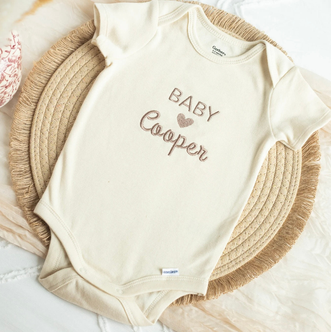 Customizable Baby Onesie with Neutral Color and Soft Fabric