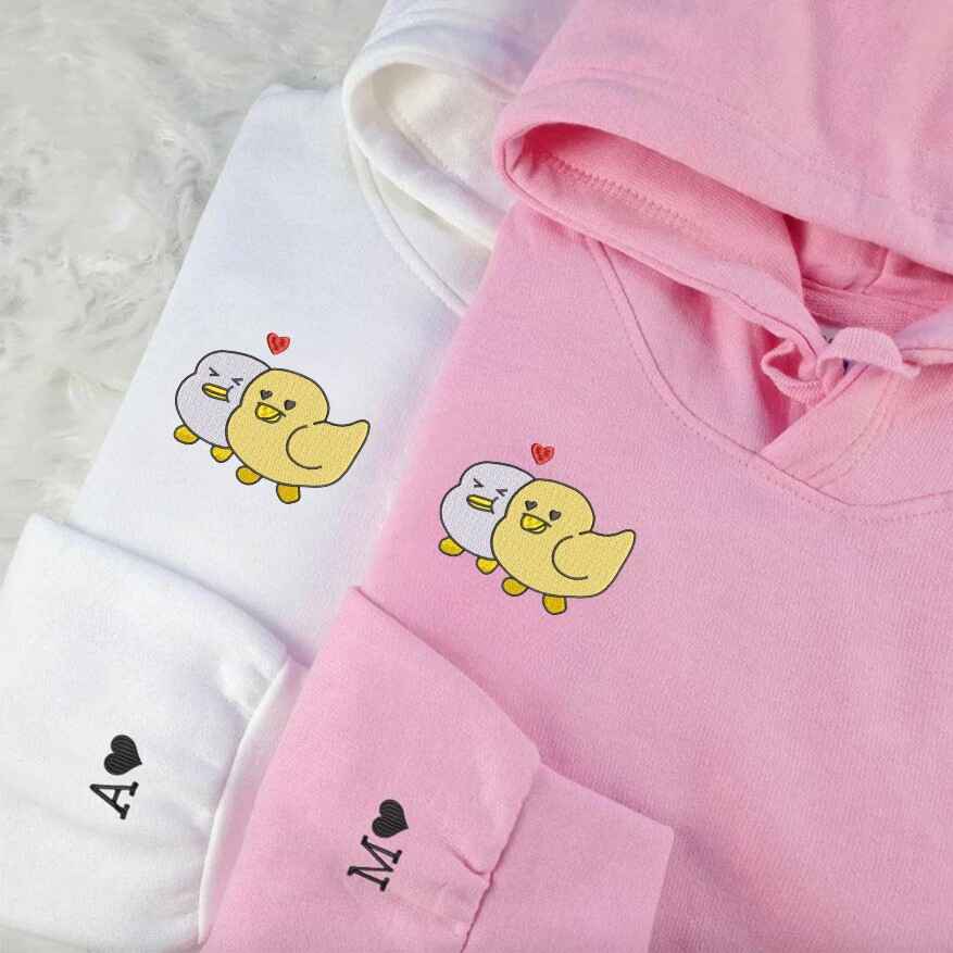 Cute love birds couple hoodies with heart detail
