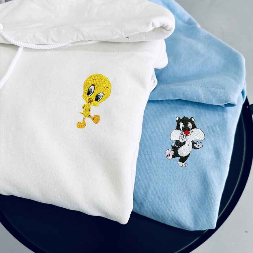 Looney Tunes-themed hoodies featuring Tweety and Sylvester for couples
