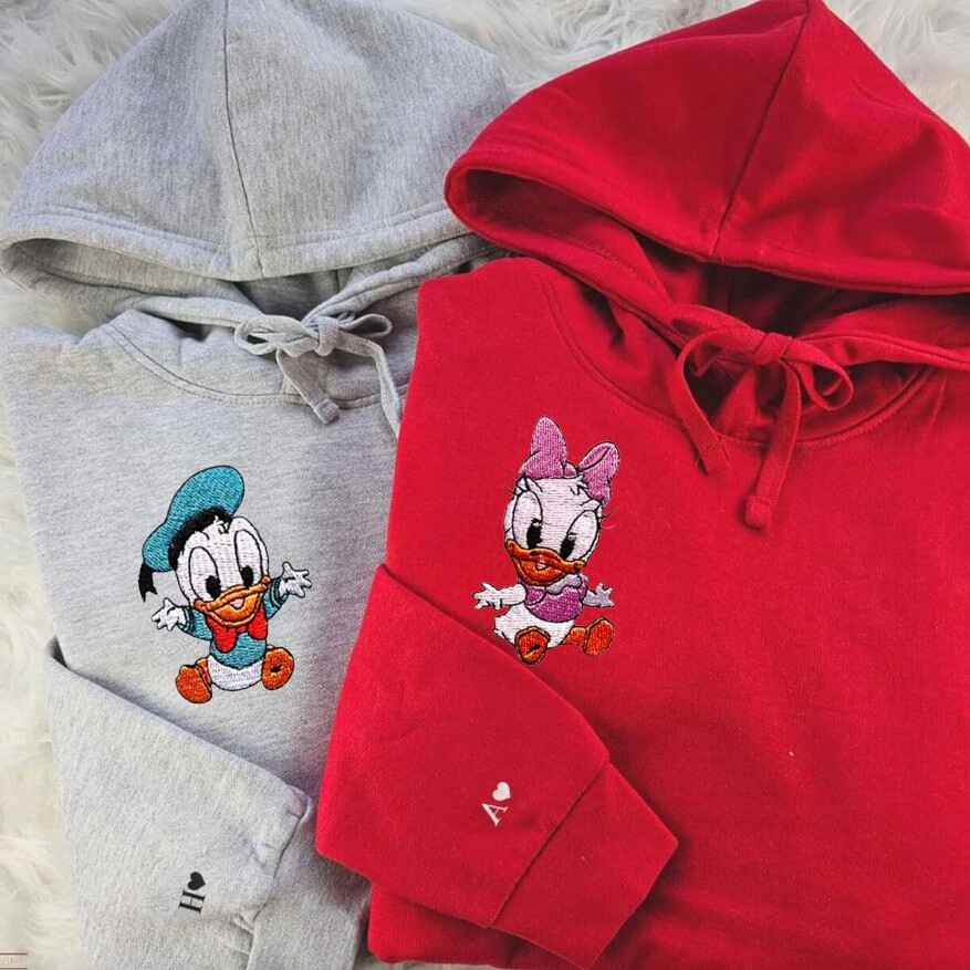 Disney-themed matching hoodies for couples featuring Donald and Daisy
