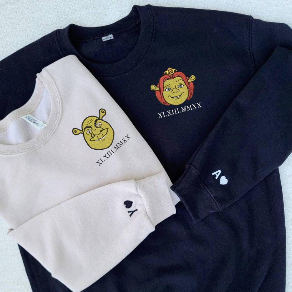 Sweatshirts with Shrek-inspired graphic and Roman numeral detailing.