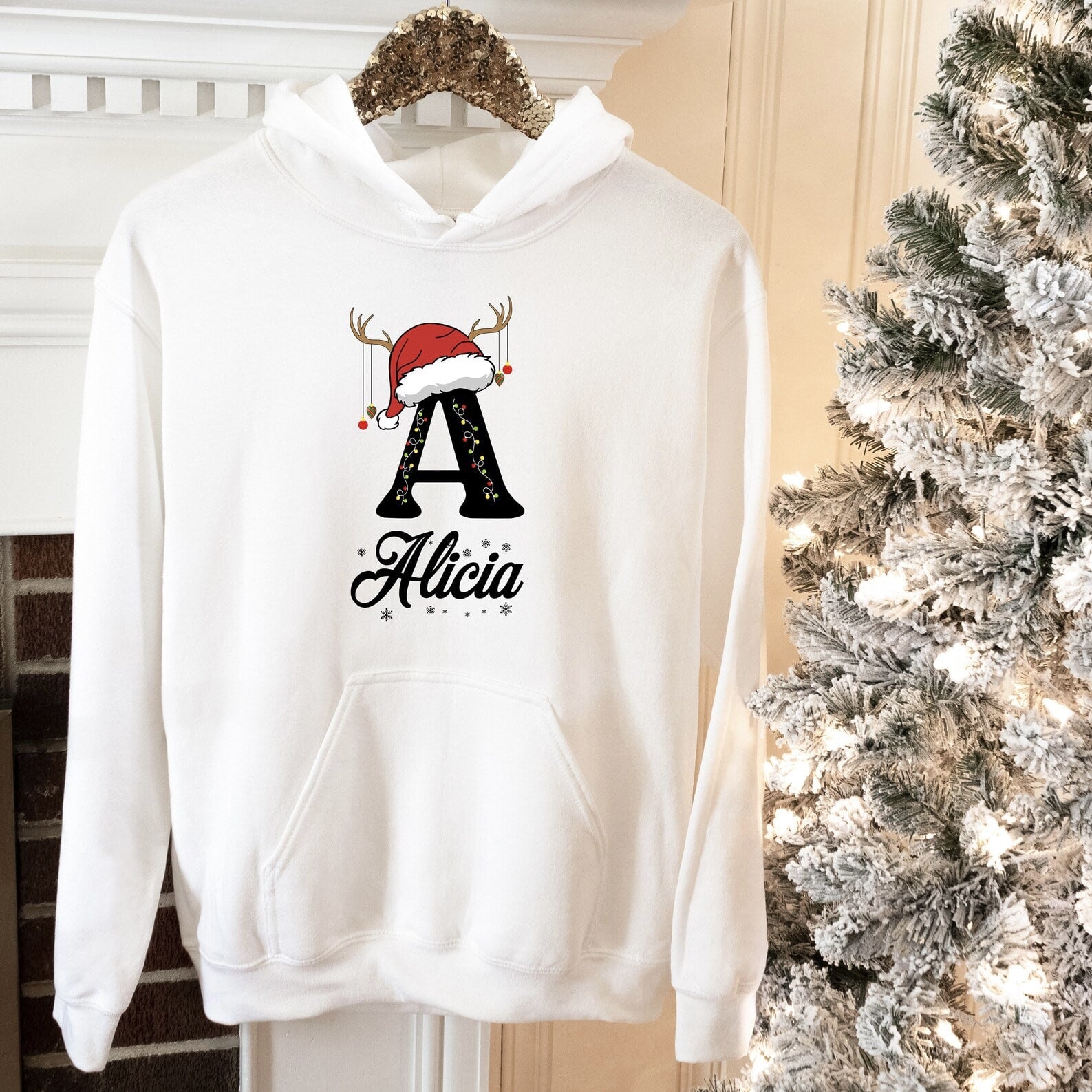 Holiday sweatshirt featuring custom name and festive design