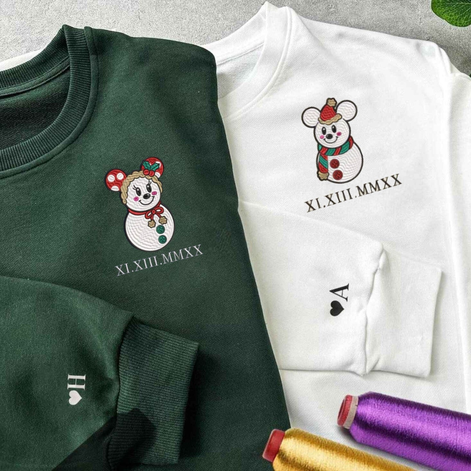 Frosty Memories holiday sweatshirt with embroidered snowman and custom date in Roman numerals.