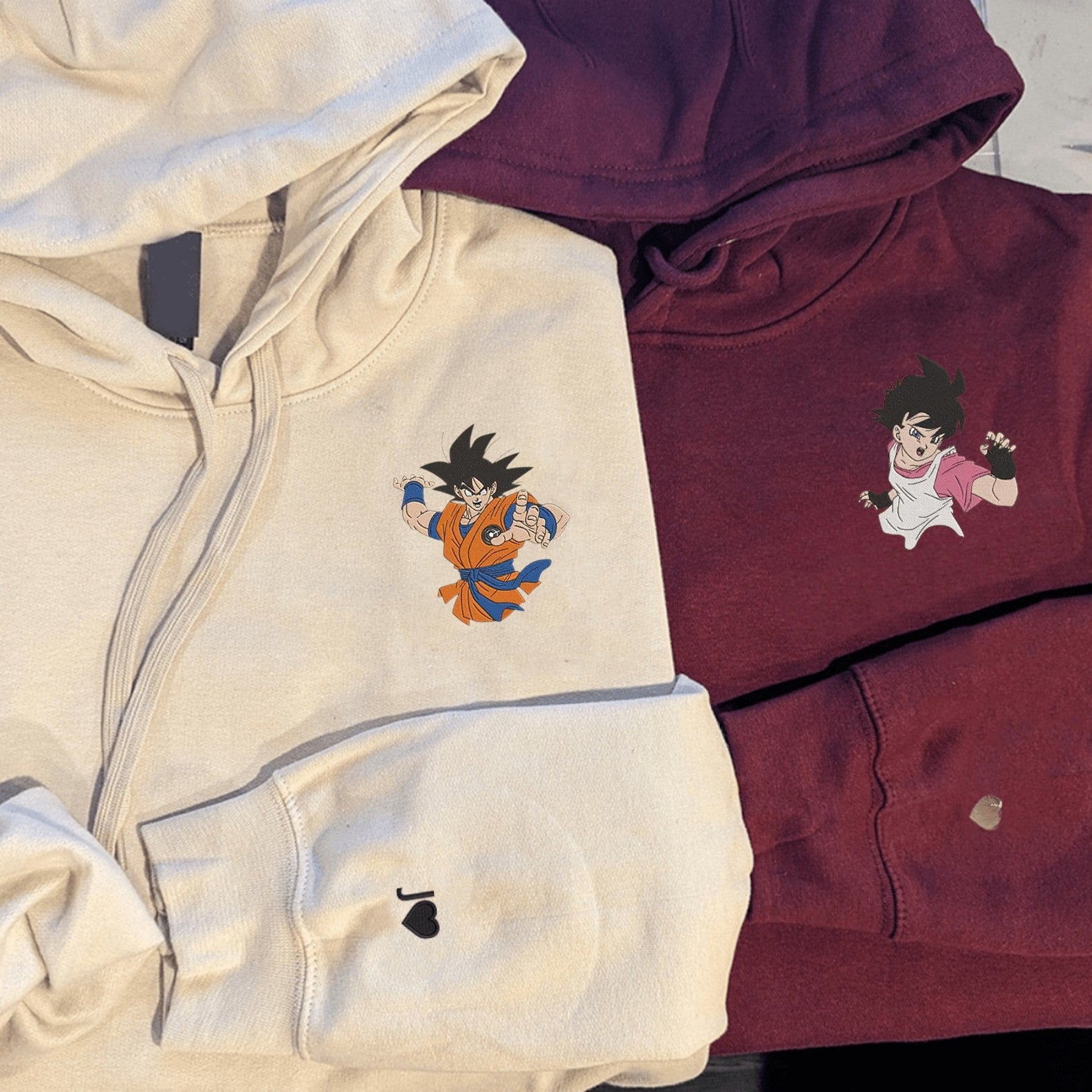 Matching Couple Hoodies styled as matching couple sweatshirts with Goku and Videl action designs.
