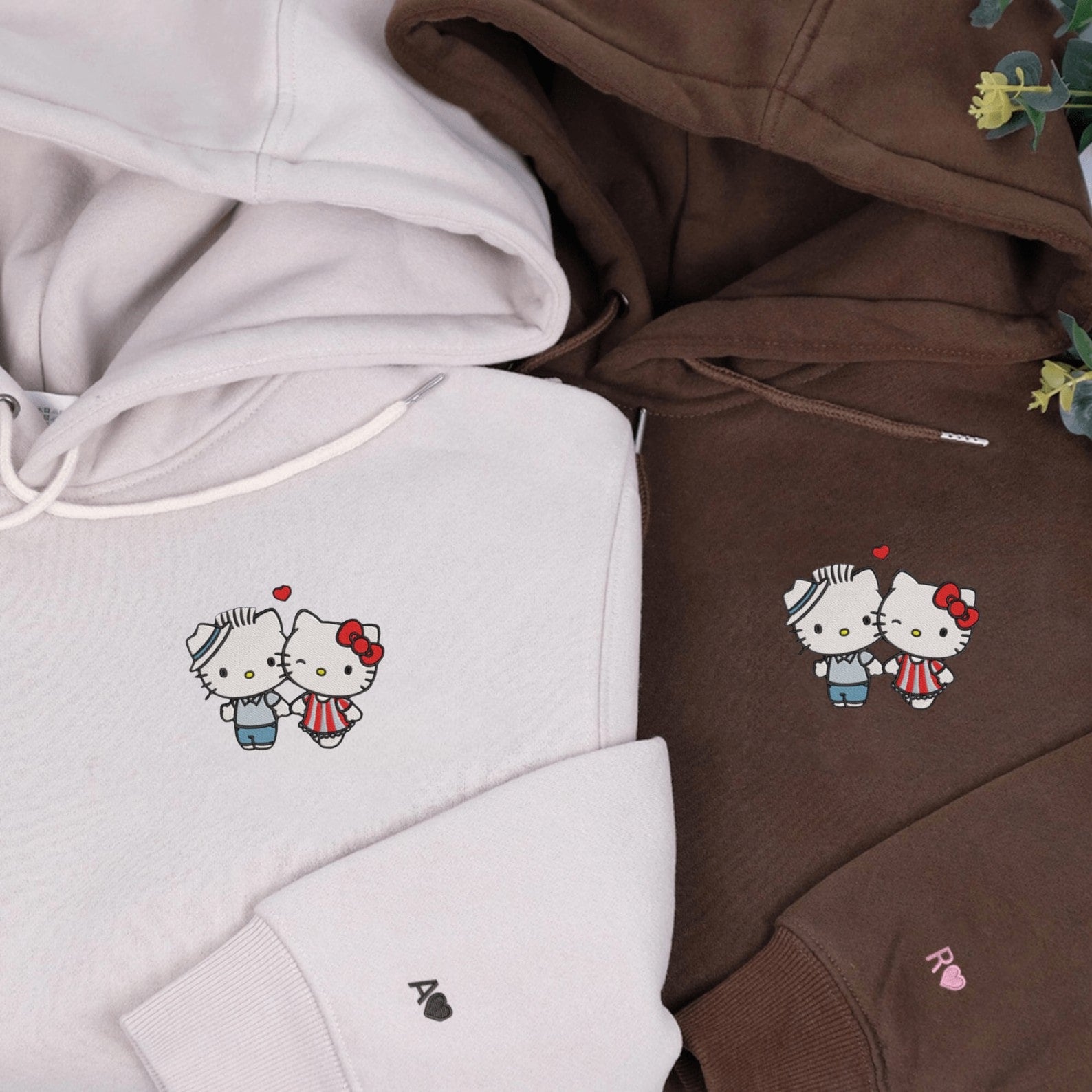 Matching Couple Hoodies featuring Hello Kitty and Dear Daniel couples matching hoodies with cute designs.
