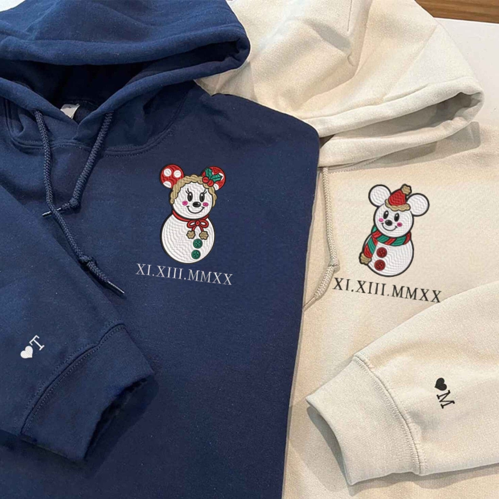 Personalized snowman hoodie featuring festive design and initials embroidery.