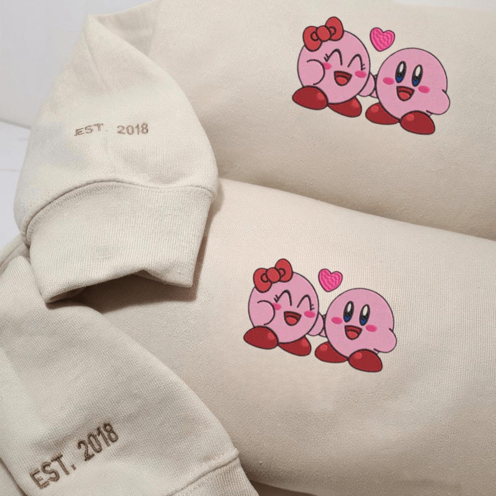 Matching Couple Hoodies styled as matching couple sweatshirts with adorable Kirby prints.
