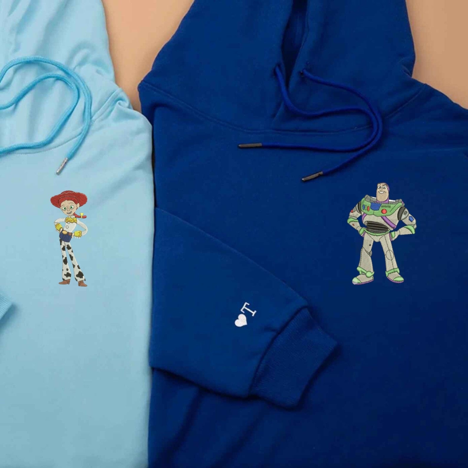 Iconic Toy Story characters Buzz and Jessie embroidered on casual wear.