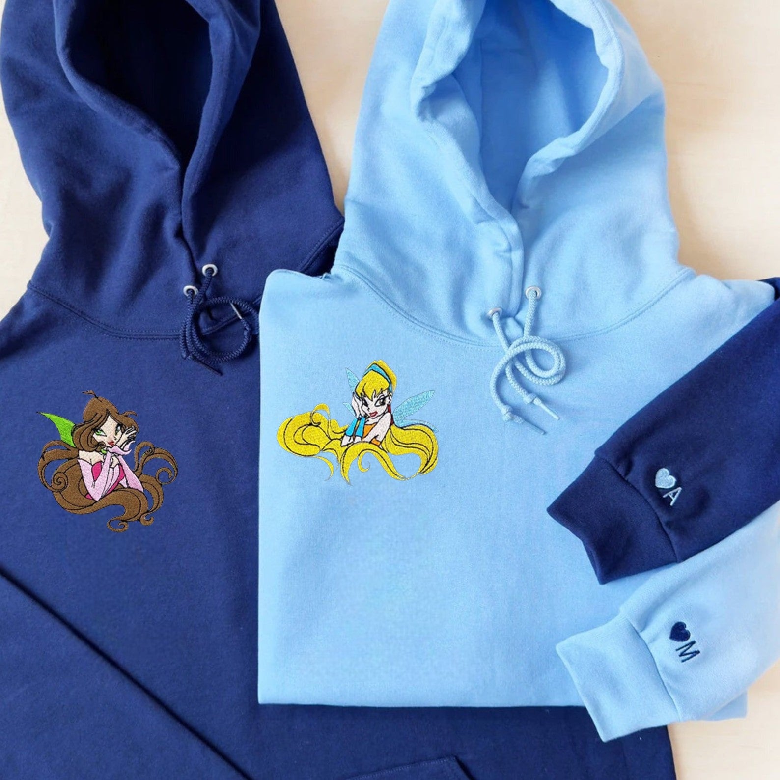 Stylish hoodie featuring enchanting fairy artwork.