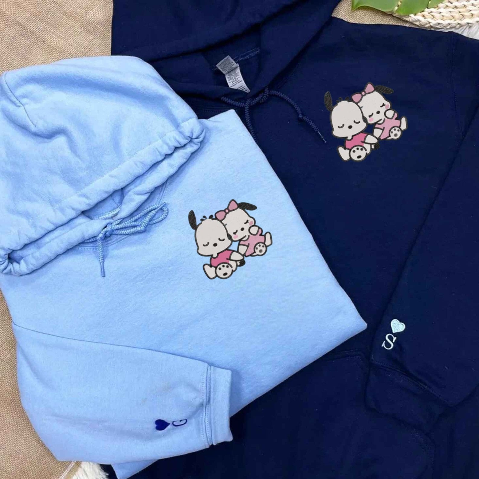 Custom hoodie featuring cute snuggling pals design and personalized initials.