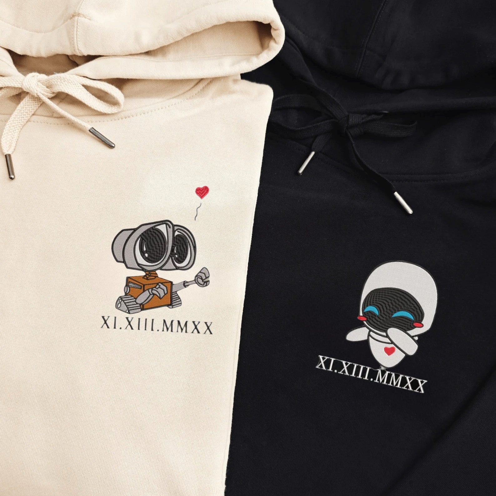 Matching Couple Hoodies with Wall-E and Eve designs, ideal matching couple sweatshirts.
