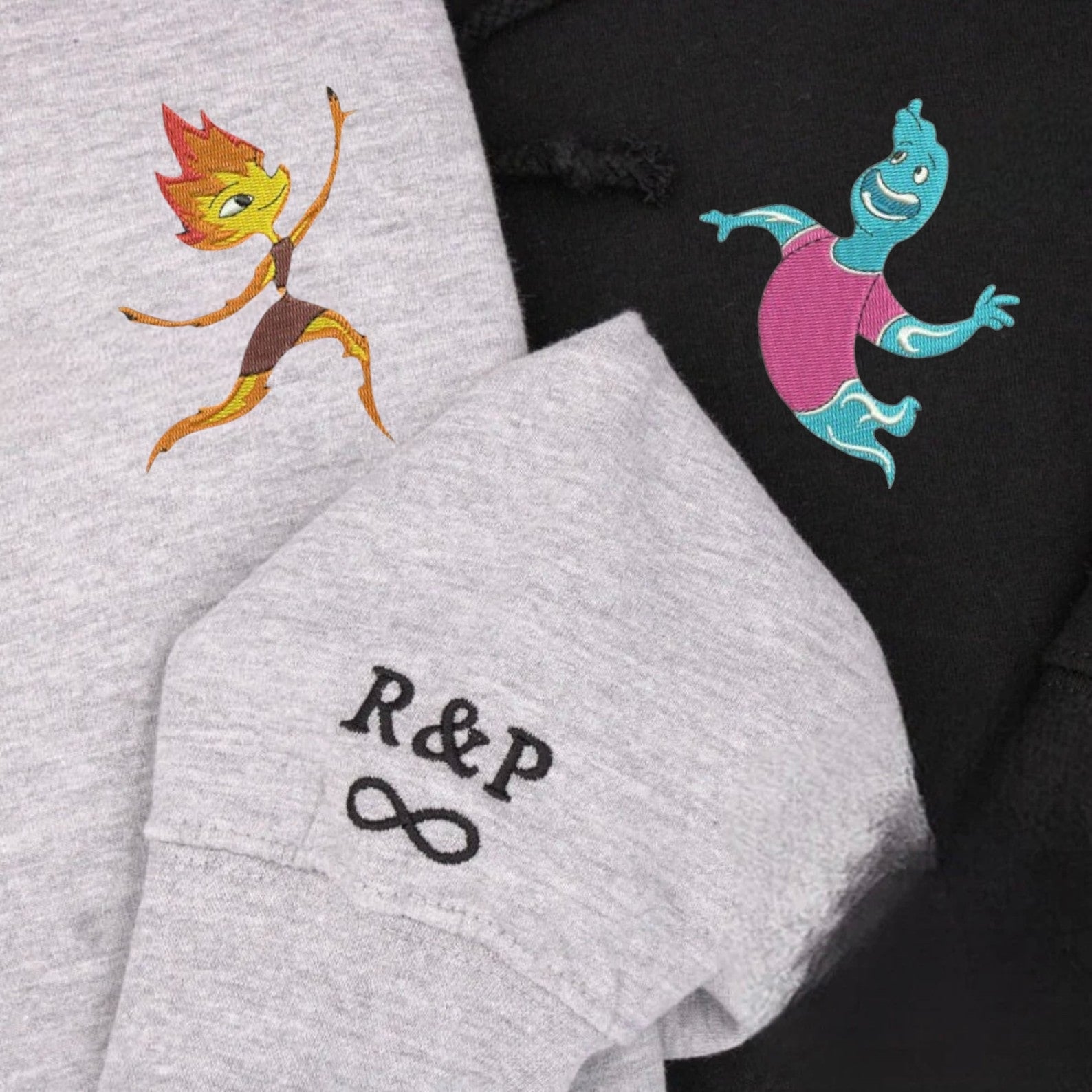 Matching Couple Hoodies with playful fire and water designs, ideal matching couple sweatshirts.
