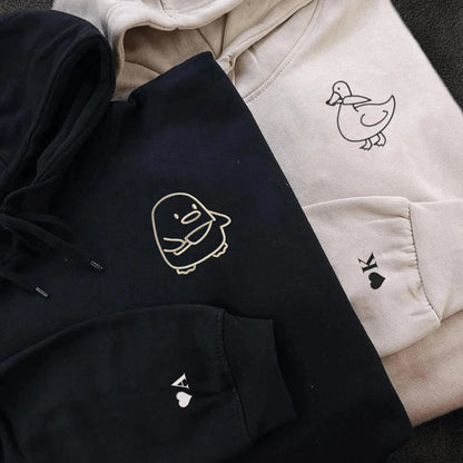 Matching Couple Hoodies with Duck Duck Goose game-inspired graphics, ideal matching couple sweatshirts.
