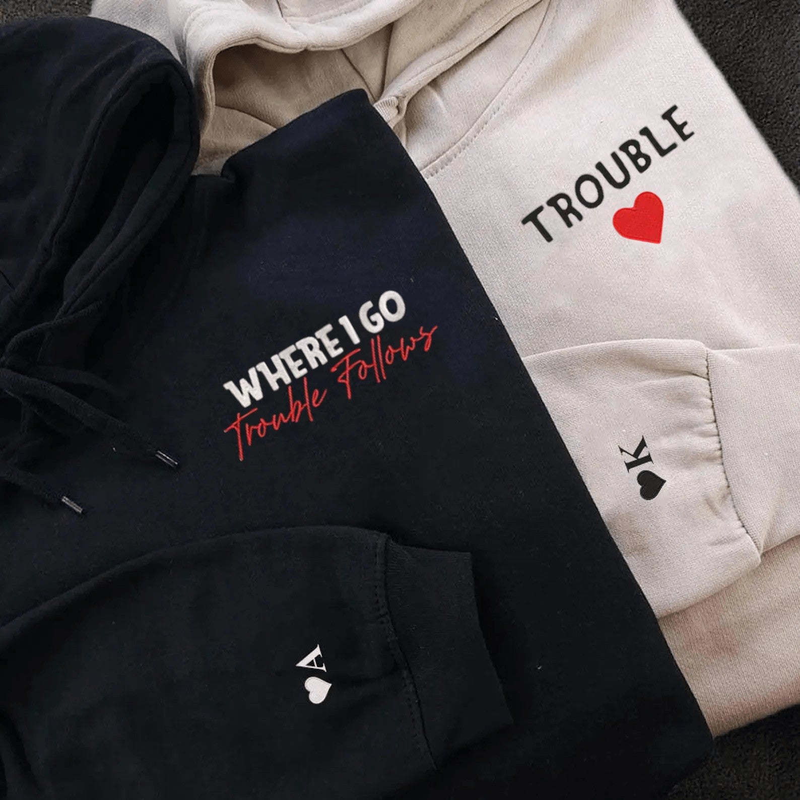 Matching Couple Hoodies with "Trouble" and "Where I Go, Trouble Follows" designs, perfect for couples matching hoodies.
