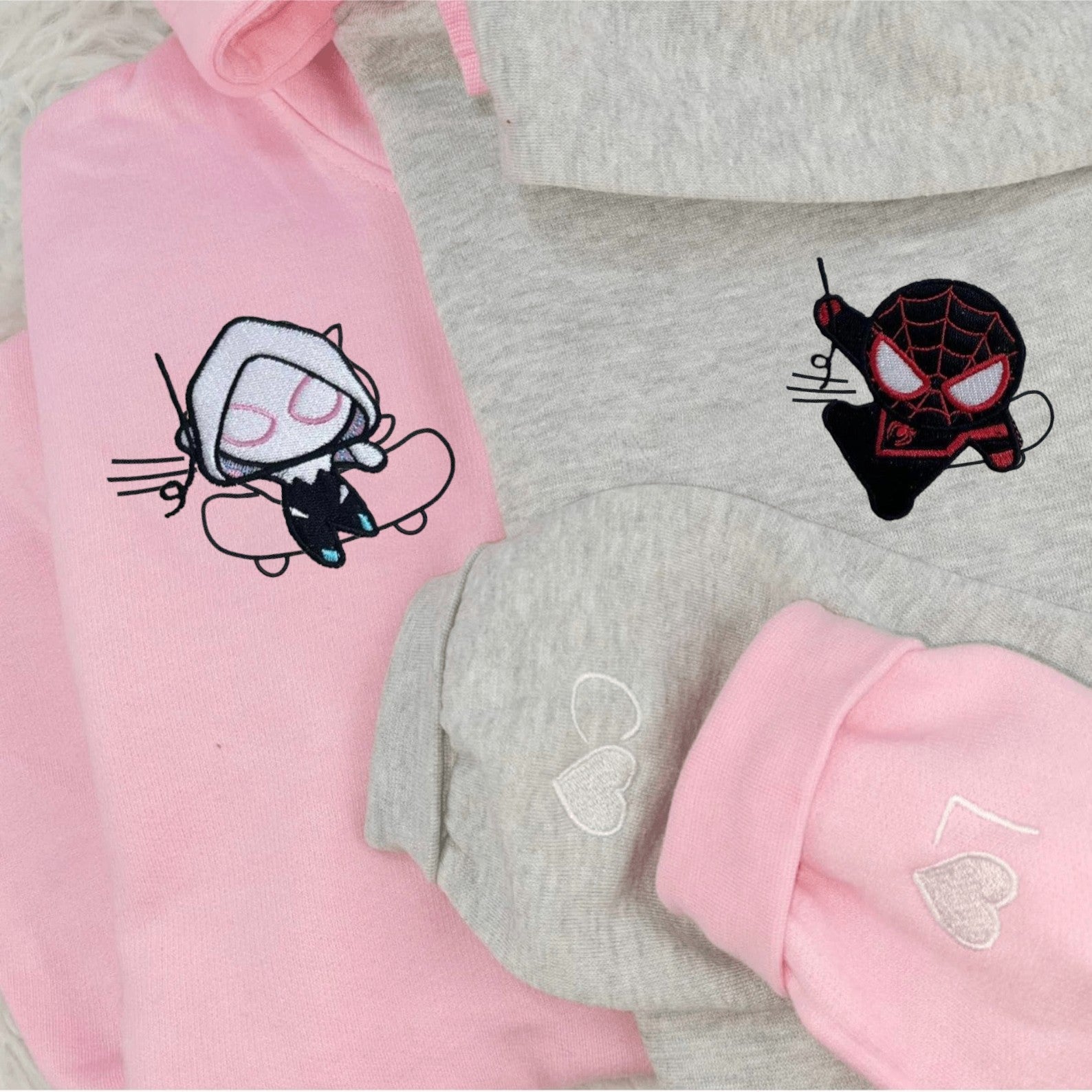 Matching Couple Hoodies with superhero graphics, great custom couple hoodies.
