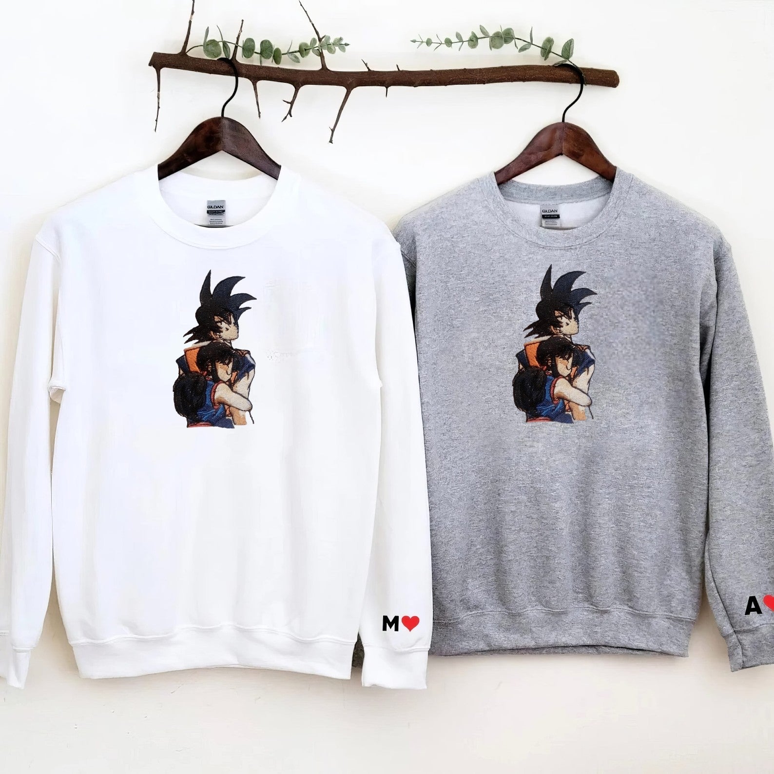 Matching Couple Hoodies with anime-inspired graphics, ideal matching couple sweatshirts.
