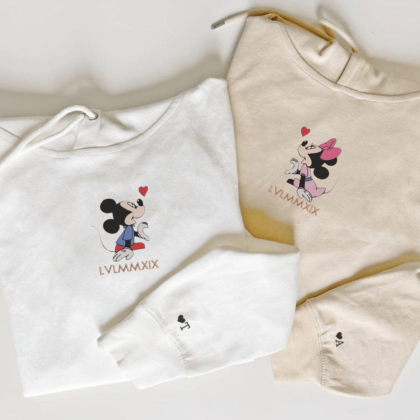 Matching Couple Hoodies styled as matching couple sweatshirts with cute cartoon mouse and date prints.
