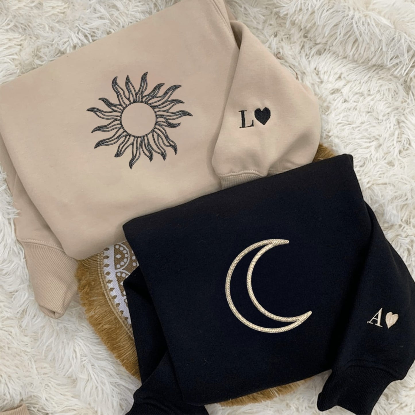 Matching Couple Hoodies featuring sun and moon graphics on matching couple sweatshirts.
