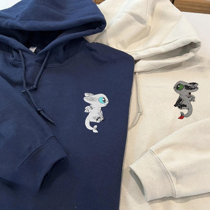 Matching Couple Hoodies with Toothless and Light Fury design, ideal matching couple sweatshirts.
