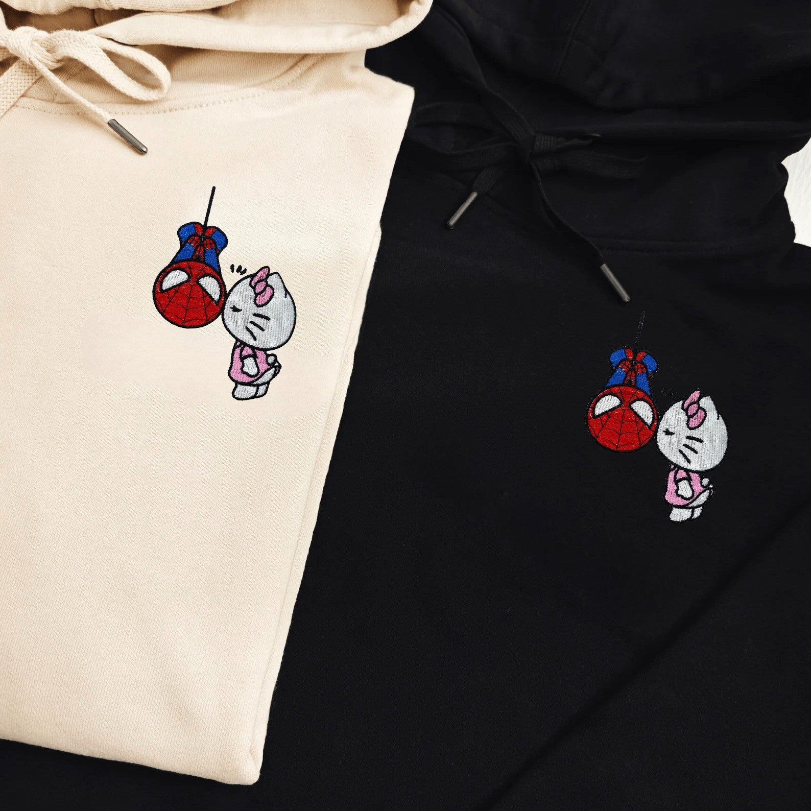 Matching Couple Hoodies with Spider-Man and Hello Kitty design, ideal matching couple sweatshirts.
