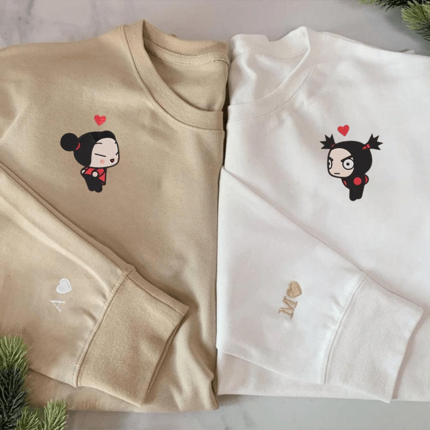 Matching Couple Hoodies with Pucca and Garu design, perfect for matching couple sweatshirts.
