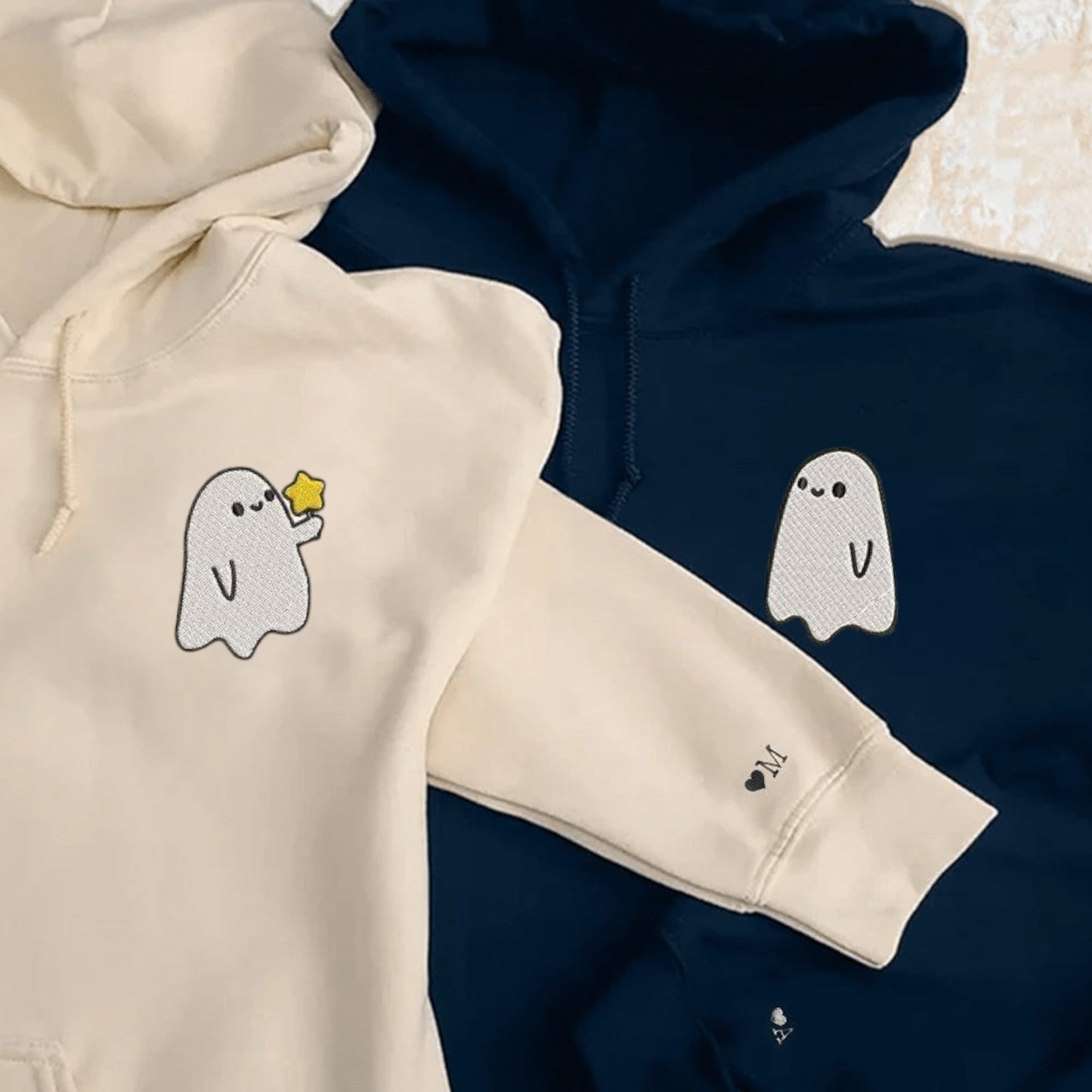 Matching Couple Hoodies with ghost designs, ideal for matching couple sweatshirts.
