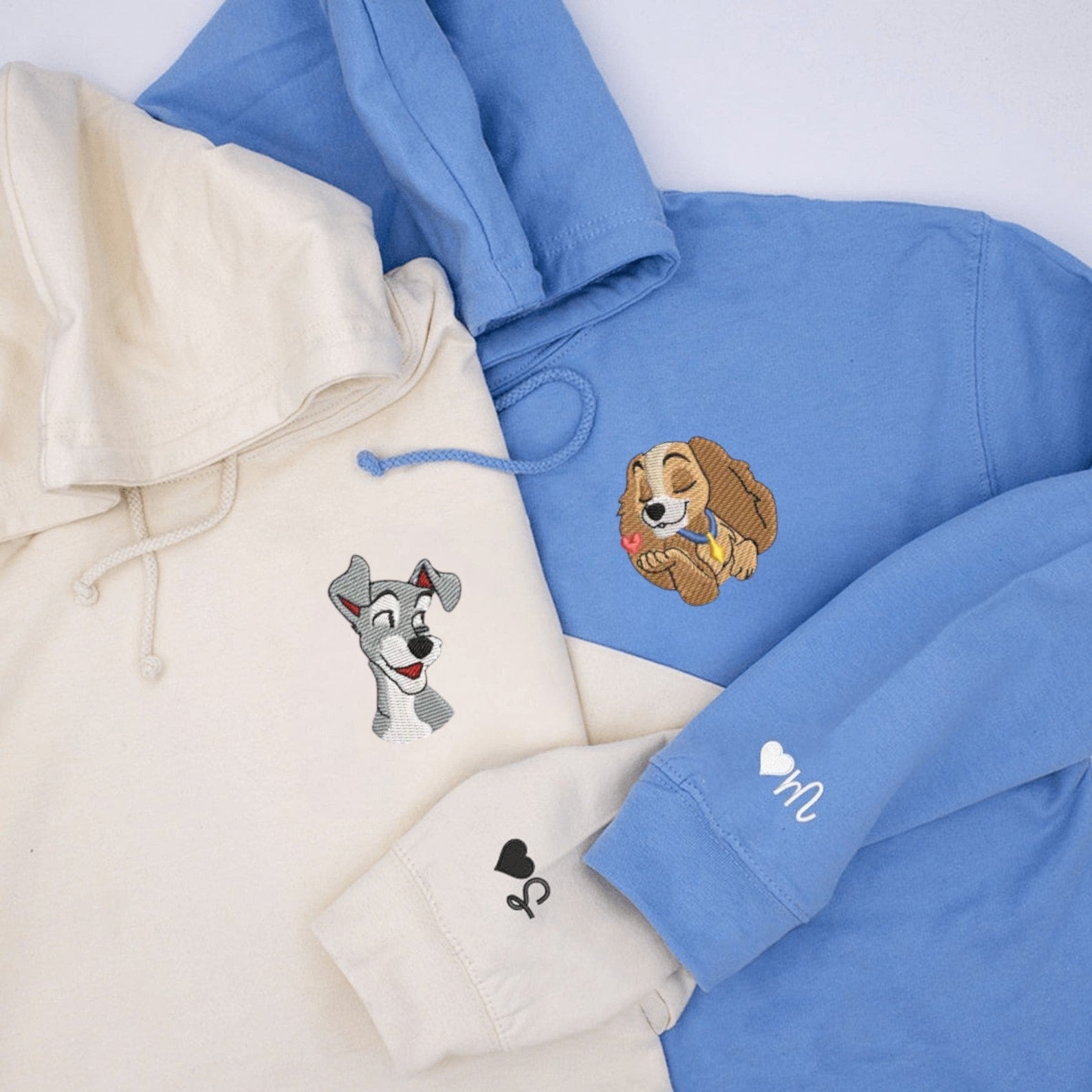 Custom embroidered graphic meme shirts showcasing two dog characters on customizable hoodies, perfect for fans of funny meme t-shirts.
