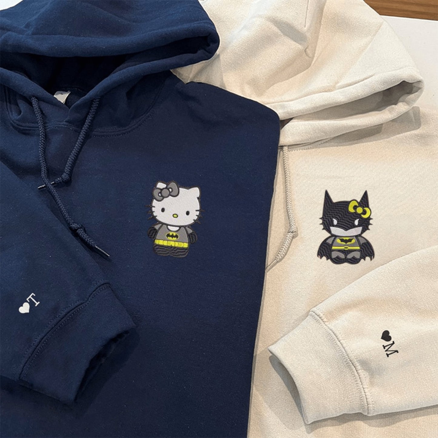 Matching Couple Hoodies with a cute Cartoon Bat and Kitten design, perfect as matching couple sweatshirts.
