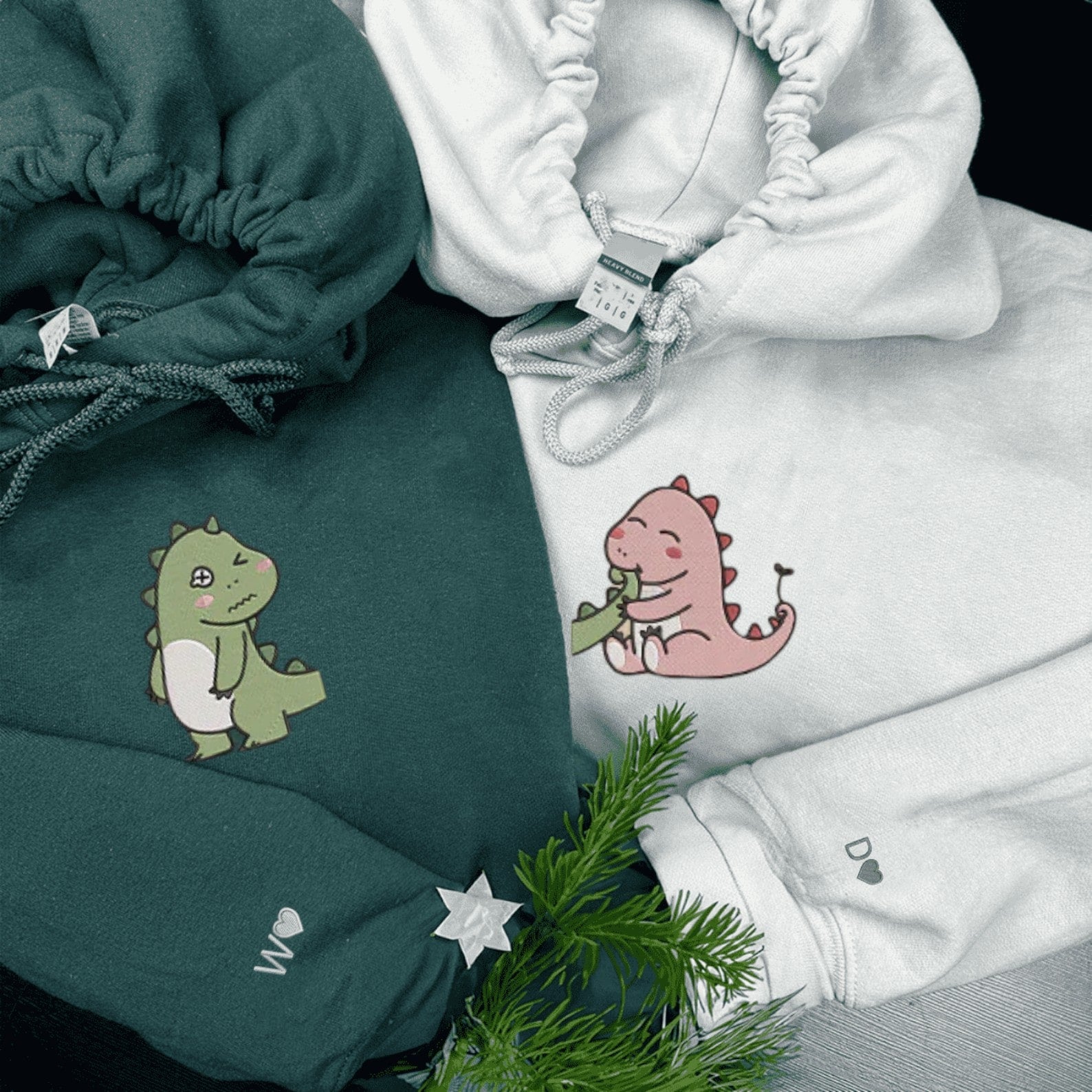 Matching Couple Hoodies with adorable dinosaur designs, ideal for matching couple sweatshirts.
