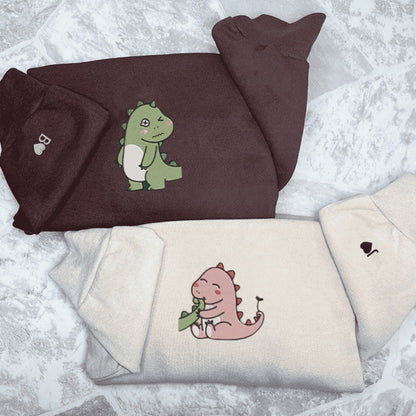 Matching Couple Hoodies featuring a cute dinosaur design, perfect for couples matching hoodies.
