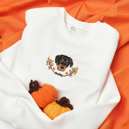 Custom embroidered hoodie-style sweatshirt with dog portrait and wreath design