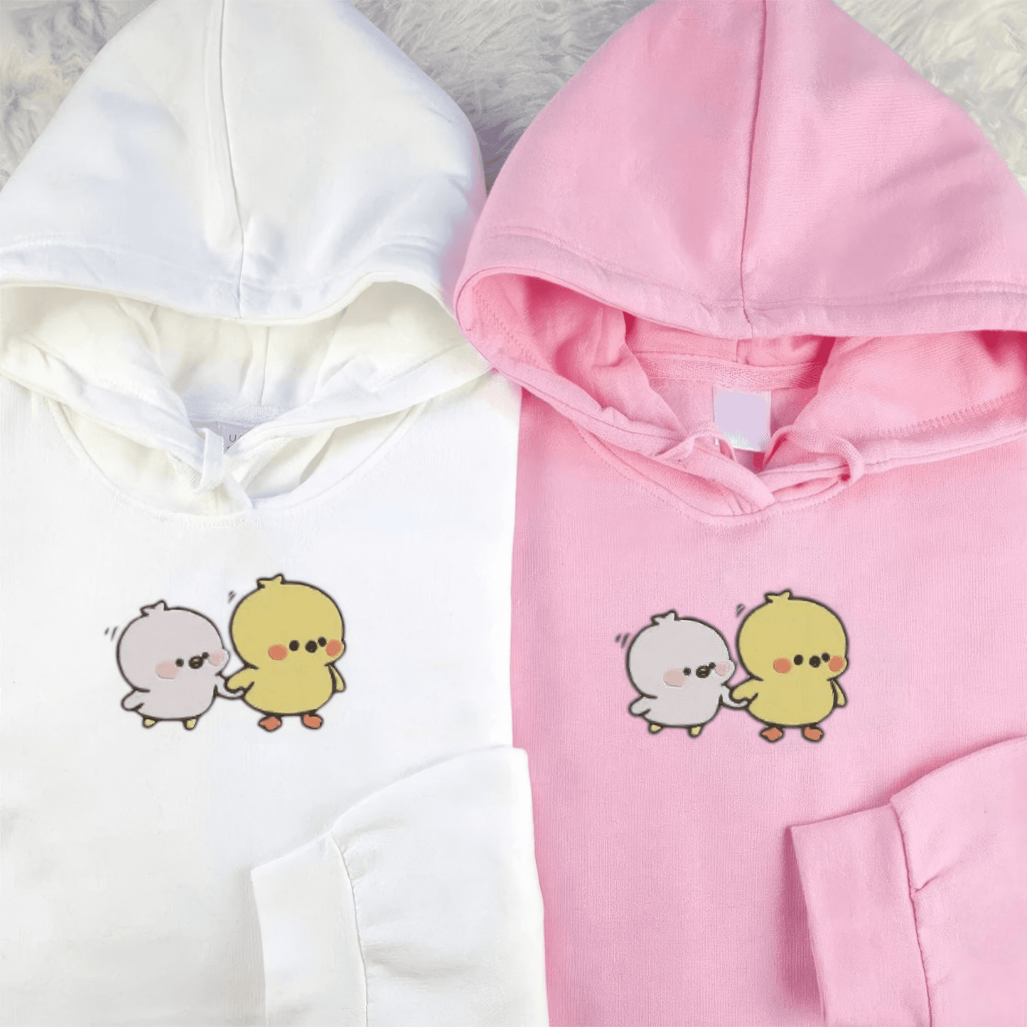 Matching Couple Hoodies with chick design on matching couple sweatshirts.
