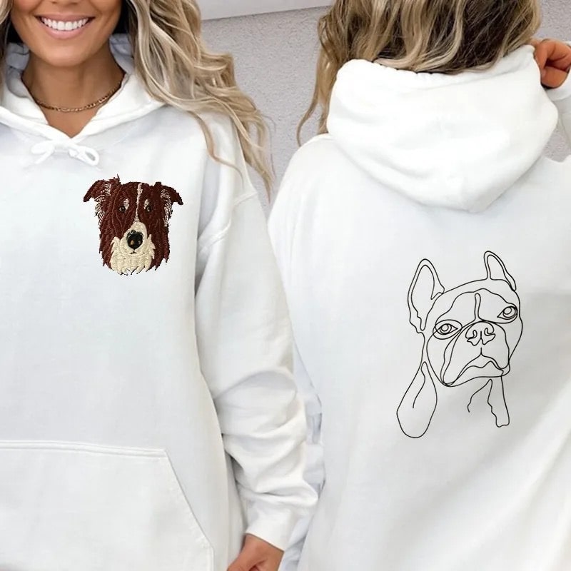 Pet lover’s sweatshirt featuring custom embroidered dog designs.