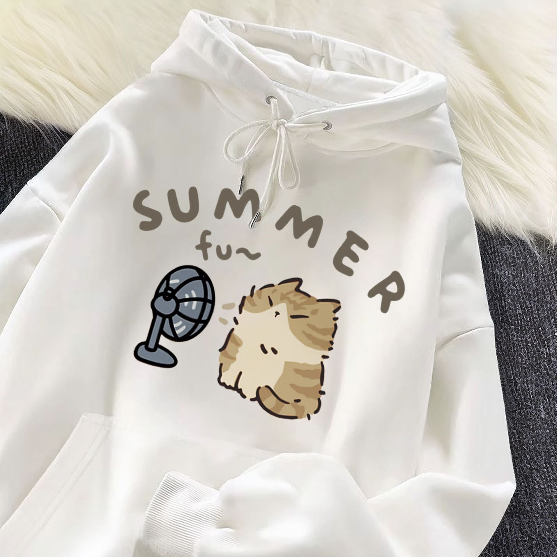 Comfortable cat-themed hoodie in beige with playful summer motif.