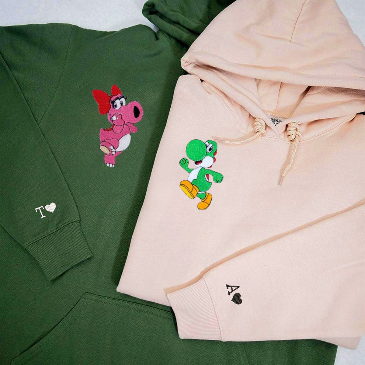 Playful Dinosaurs Valentine Couple Hoodies showcasing vibrant and cute dinosaur characters.