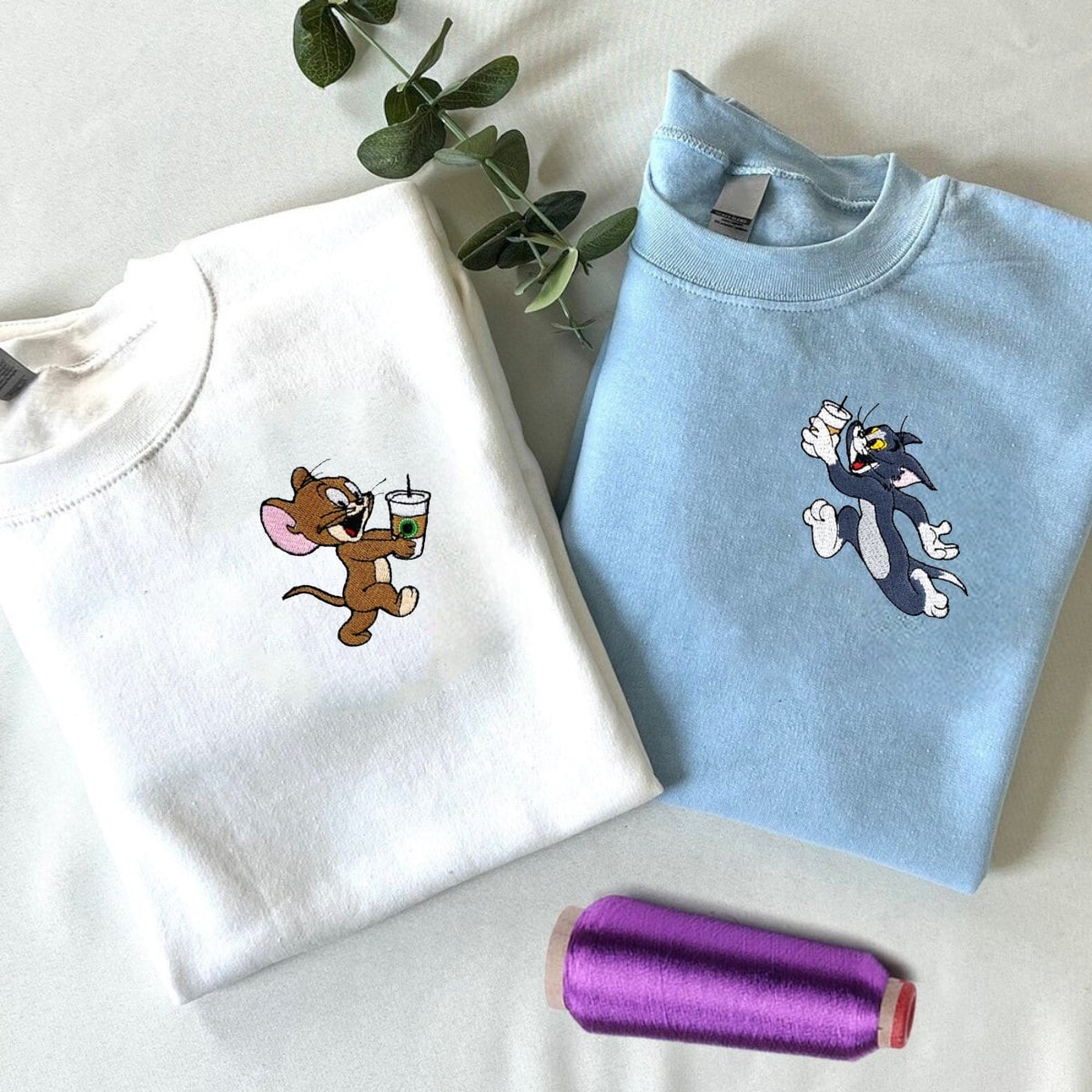 Couple hoodies featuring fun cartoon characters, ideal for casual outings.