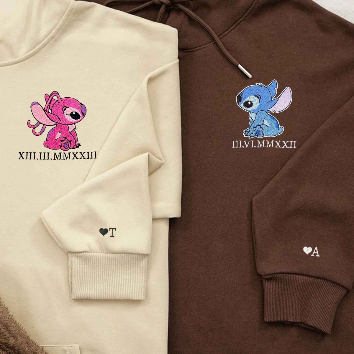 Comfortable and stylish couple hoodies with playful character embroidery and personalized cuffs.