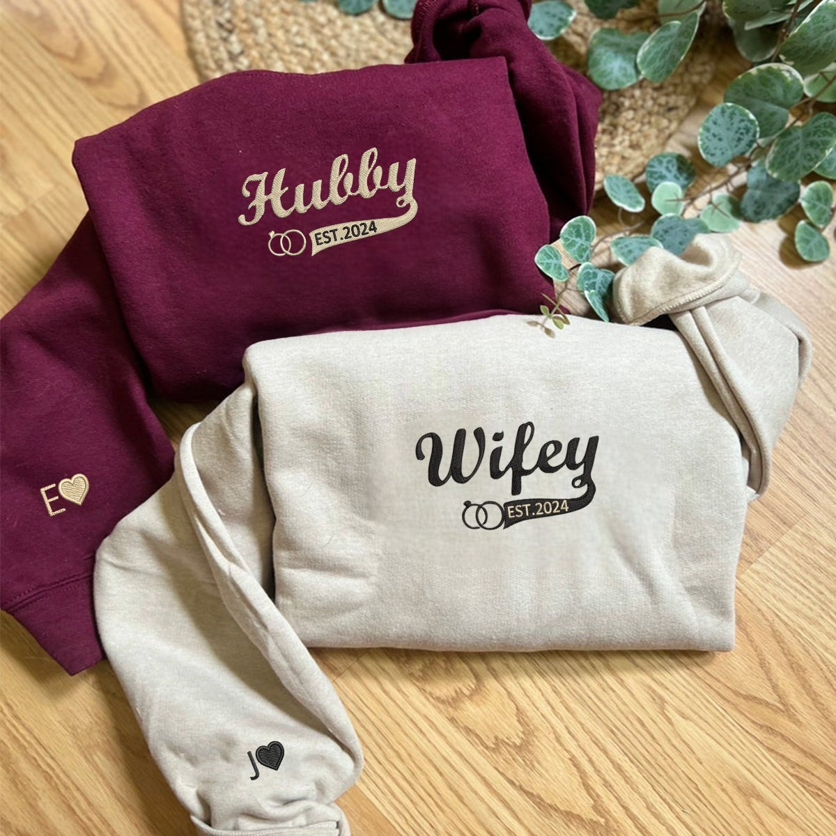 Anniversary hoodies for couples with personalized 'Wifey' and 'Hubby' designs.