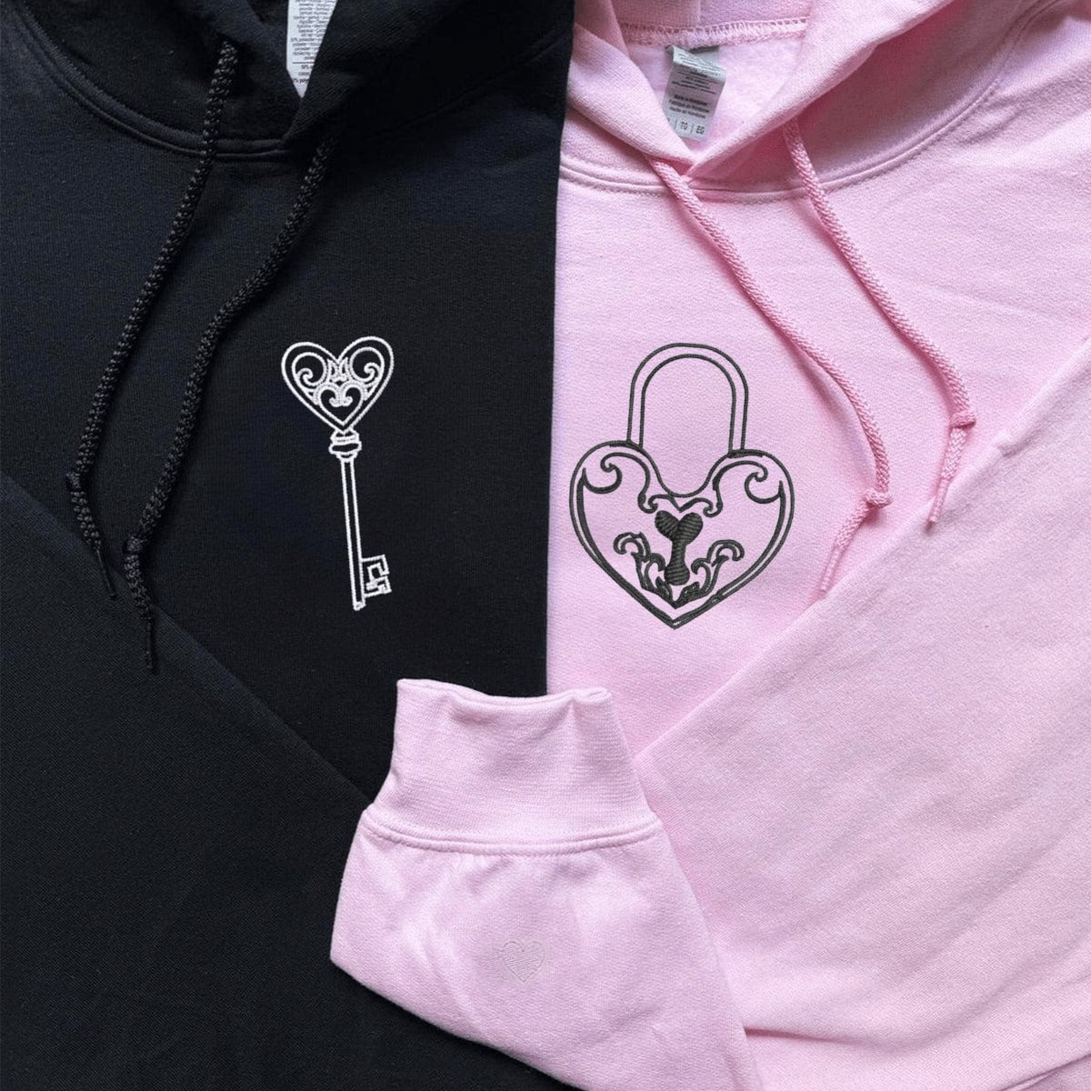 Cozy couple hoodies showcasing intricate key and lock designs with thoughtful details.