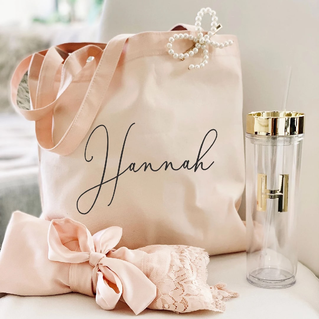 Elegant bridesmaid tote bags customized with names, perfect for bridal parties.