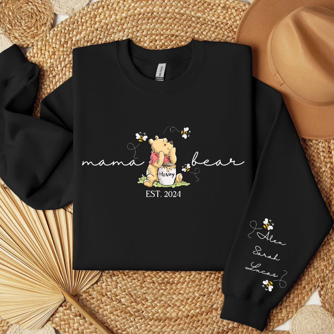 Graphic sweatshirt with Mama Bear design and custom embroidery, perfect for cool weather