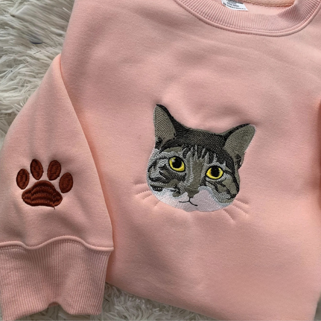 Personalized sweatshirt for dog and cat lovers featuring custom embroidery of pet’s face - custom embroidered sweatshirts