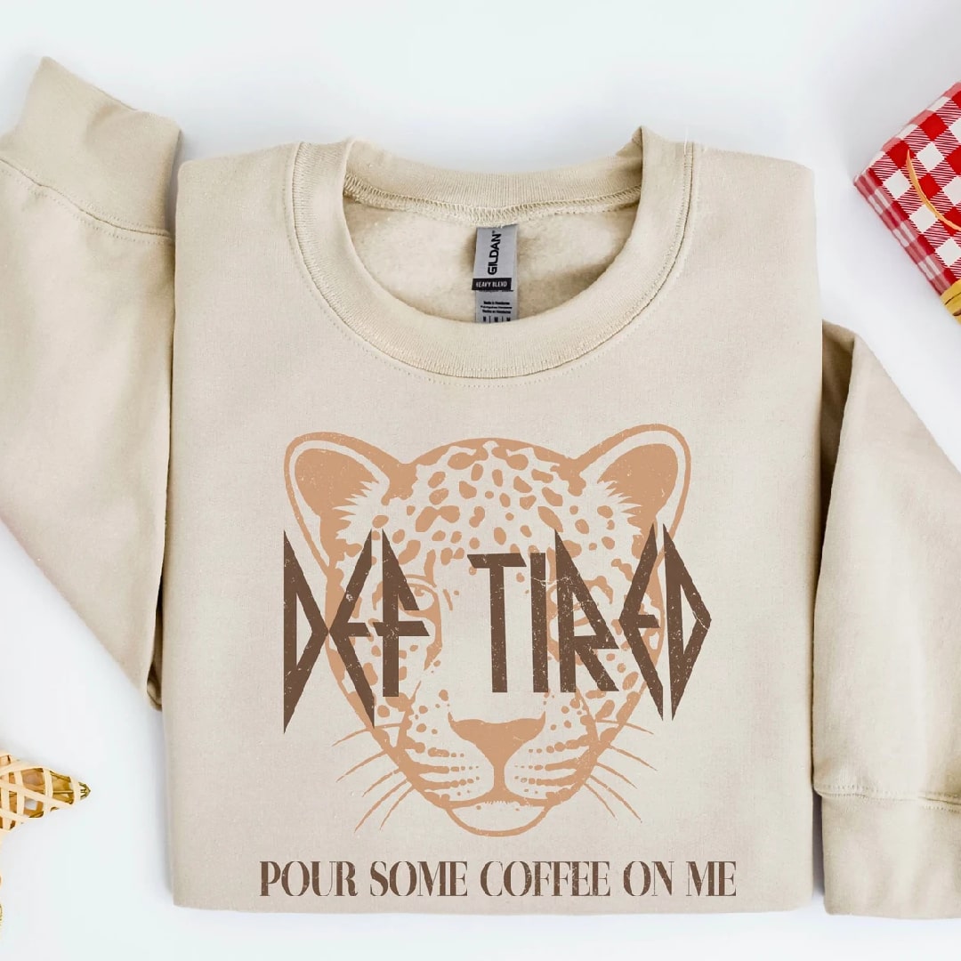 Beige "DEEP TIRED" graphic sweatshirt with leopard design and coffee phrase