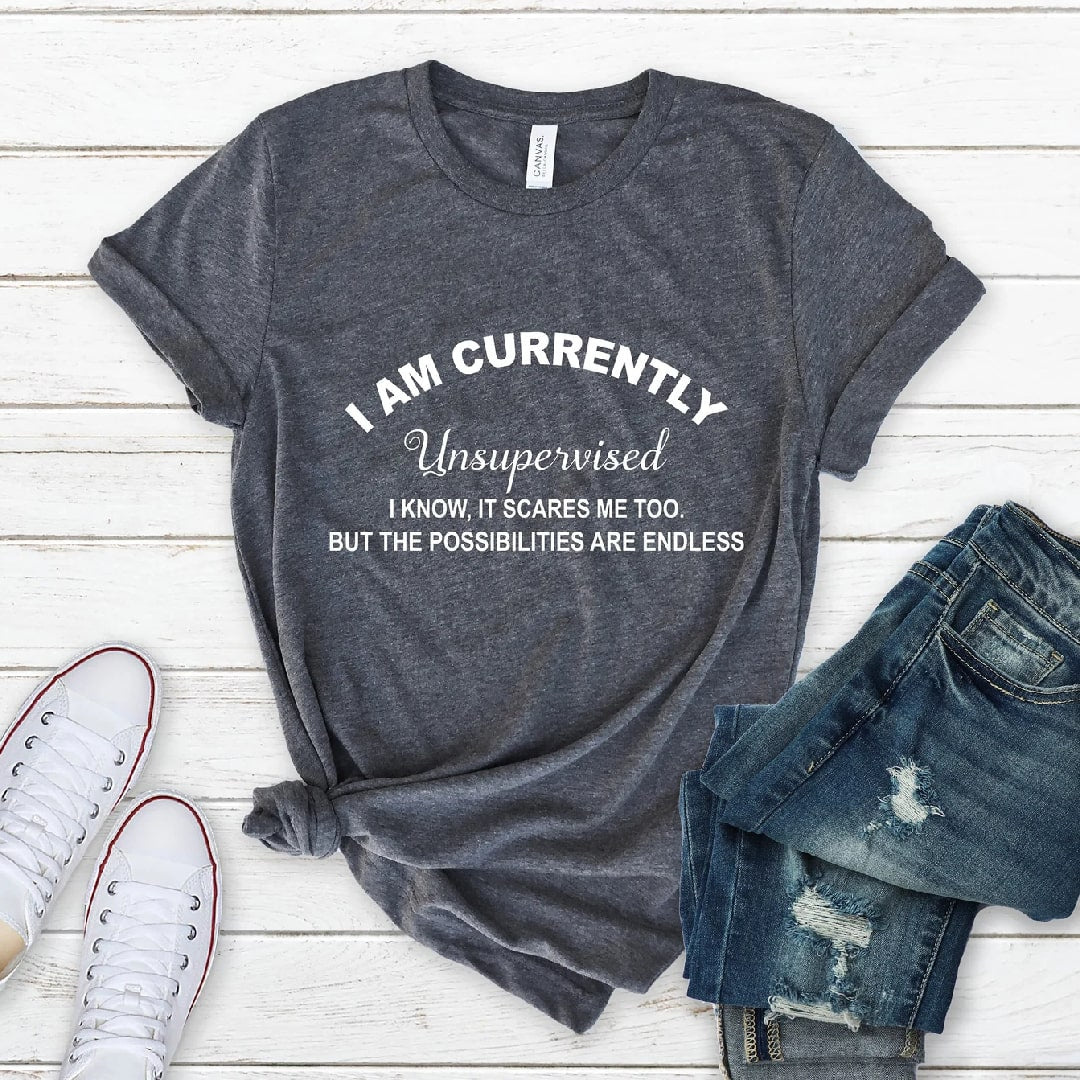 Gray t-shirt featuring "I Am Currently Unsupervised" with a playful message