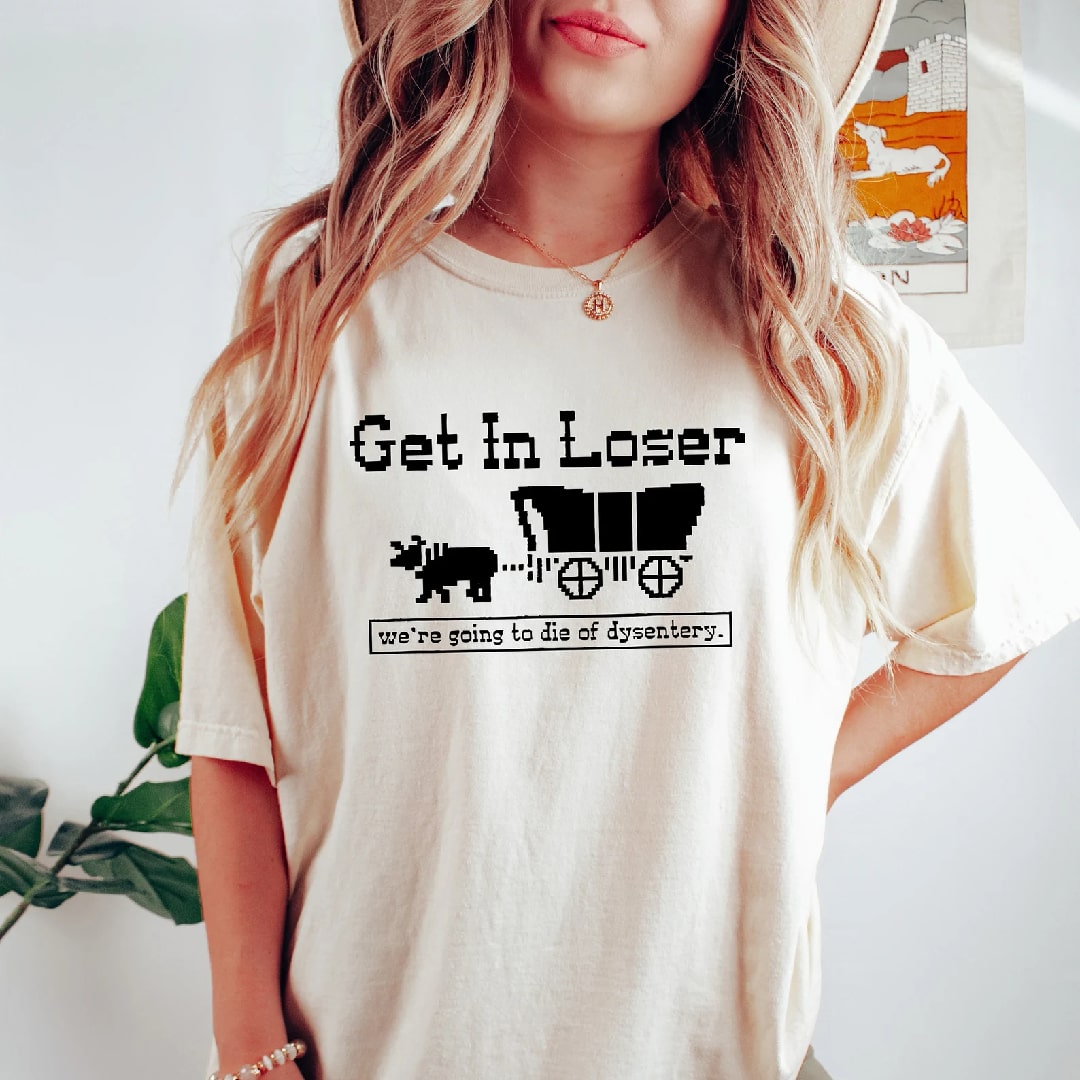 Casual t-shirt featuring a humorous retro gaming design "Get In Loser"