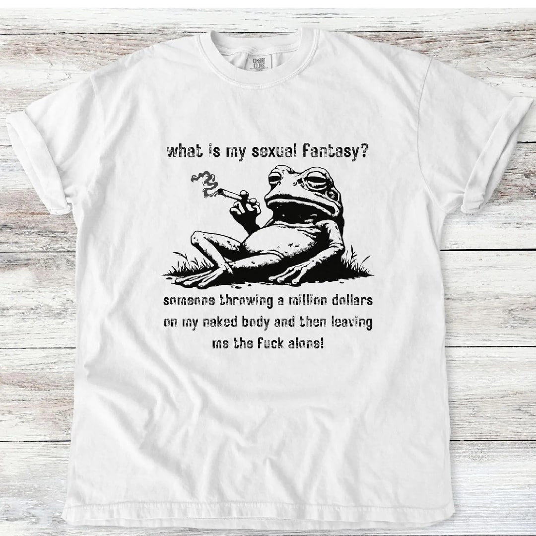 A white frog graphic tee with a bold humorous message on a casual day out