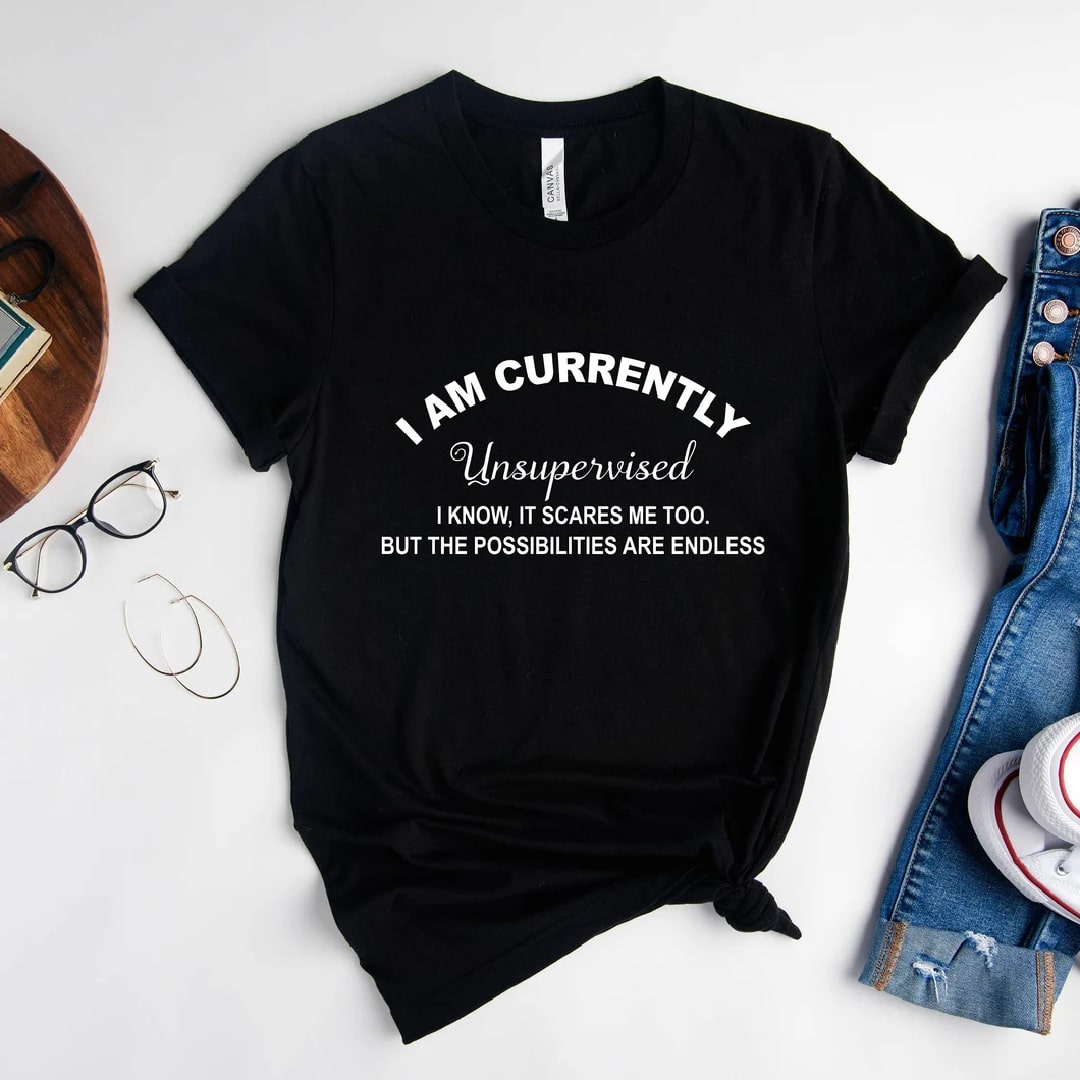 Black "I Am Currently Unsupervised" t-shirt with humorous text