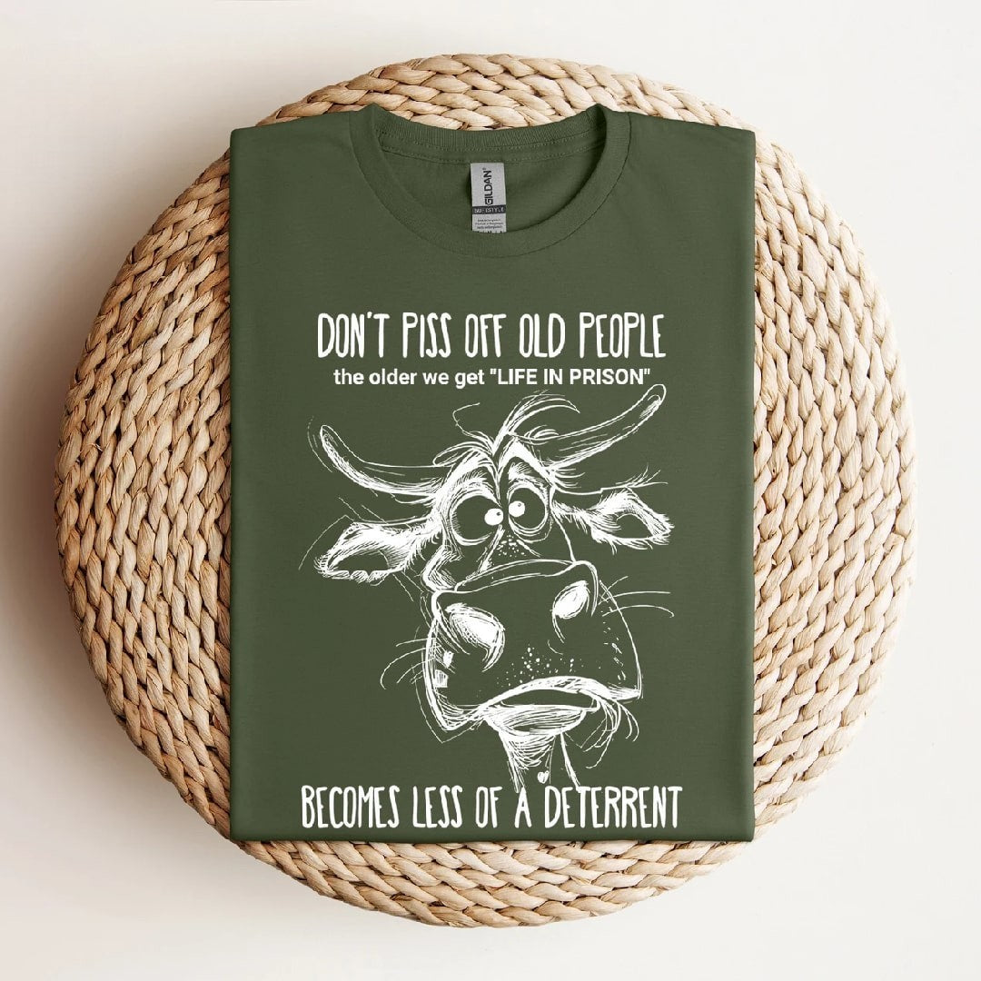 Green "Don't Piss Off Old People" t-shirt with cow graphic