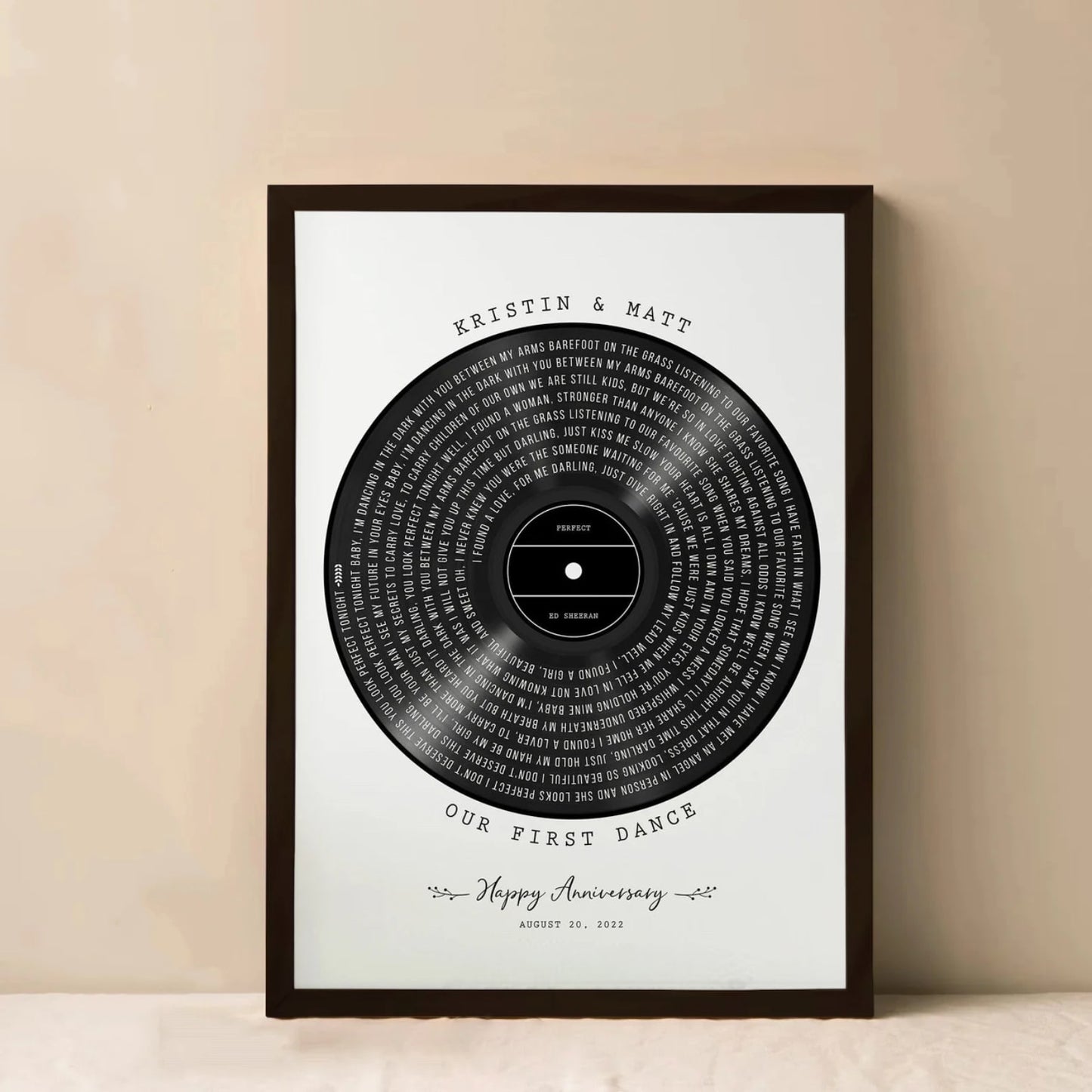 Custom vinyl record-style wall art with song lyrics and personalized anniversary details, ideal gift for couples

