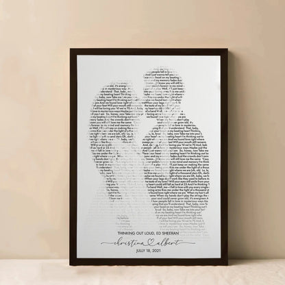 Custom song lyrics wall art featuring personalized portrait from couple’s photo
